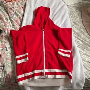 Red and white zip up jacket.